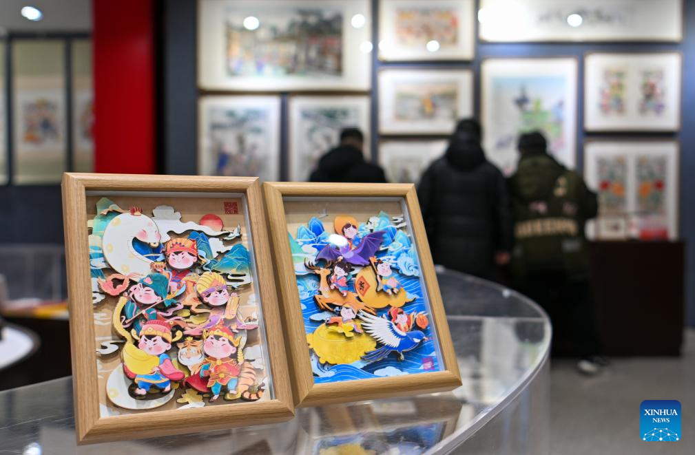 Products with Yangliuqing woodblock new year pictures created under inspiration of Year of Snake in Tianjin